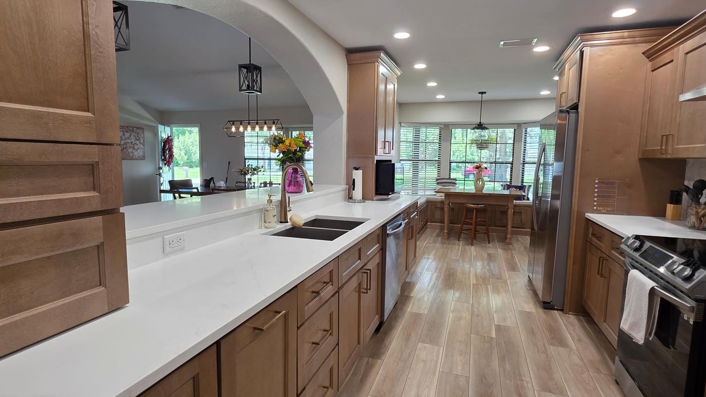 Spotless kitchen with a freshly wiped marble island after a Palma clean
