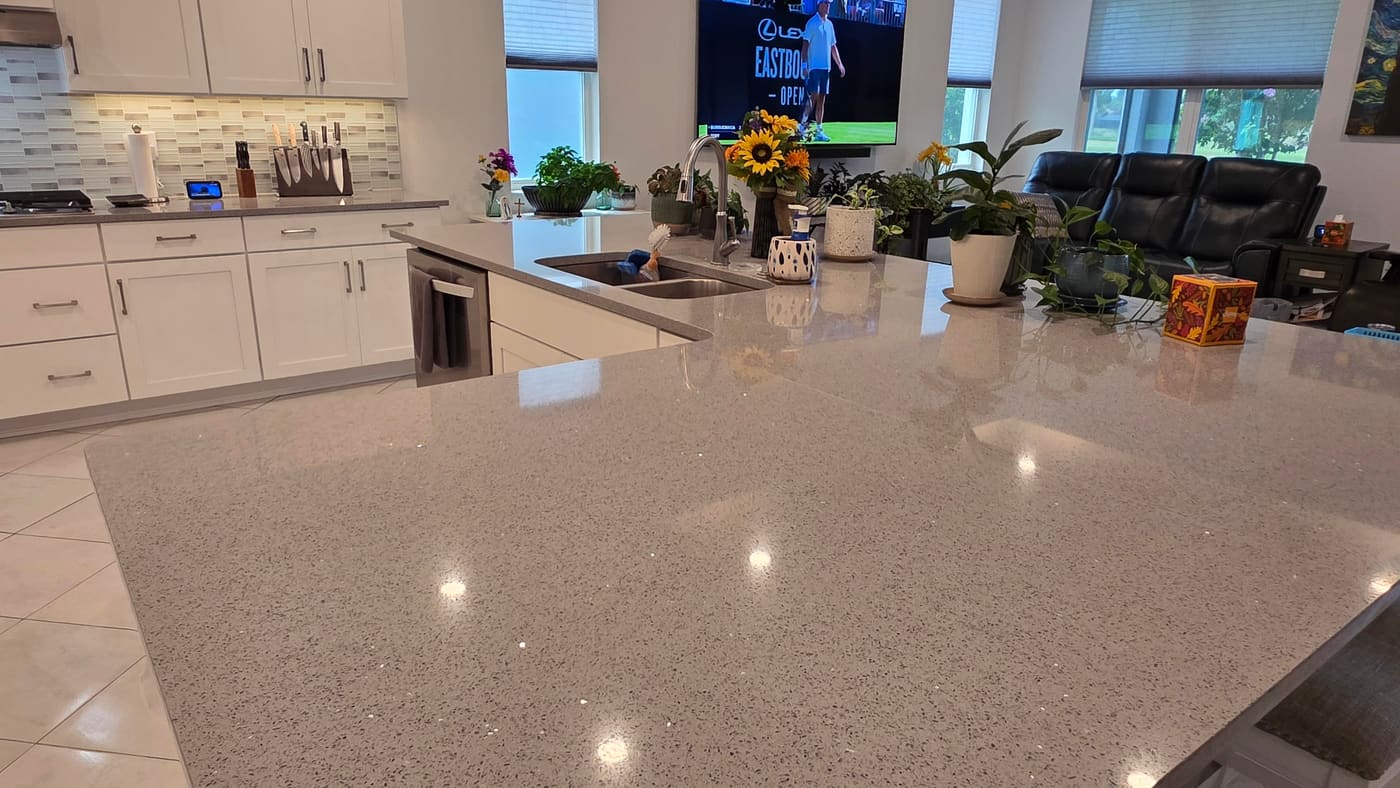 Sparkling quartz kitchen counters cleared and cleaned